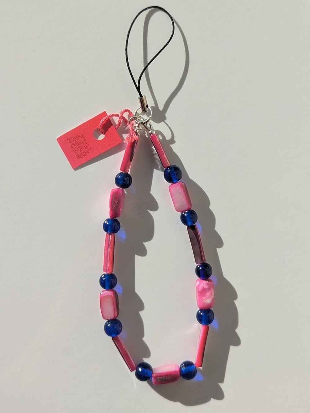 BNWT Full Bead Mode Phone Strap